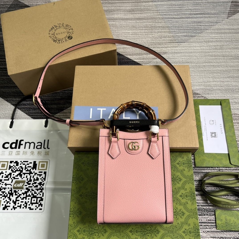 G*u*i top handle bags